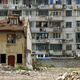 Illustration for article titled Nine Stubborn Nail Houses Giving the Finger to Redevelopment
